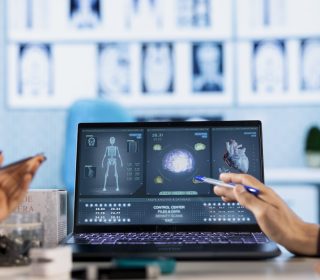 Medical expert and patient meeting at a check up appointment to discuss lab test results and potential treatment for recovery. Healthcare industry with medical insurance services.