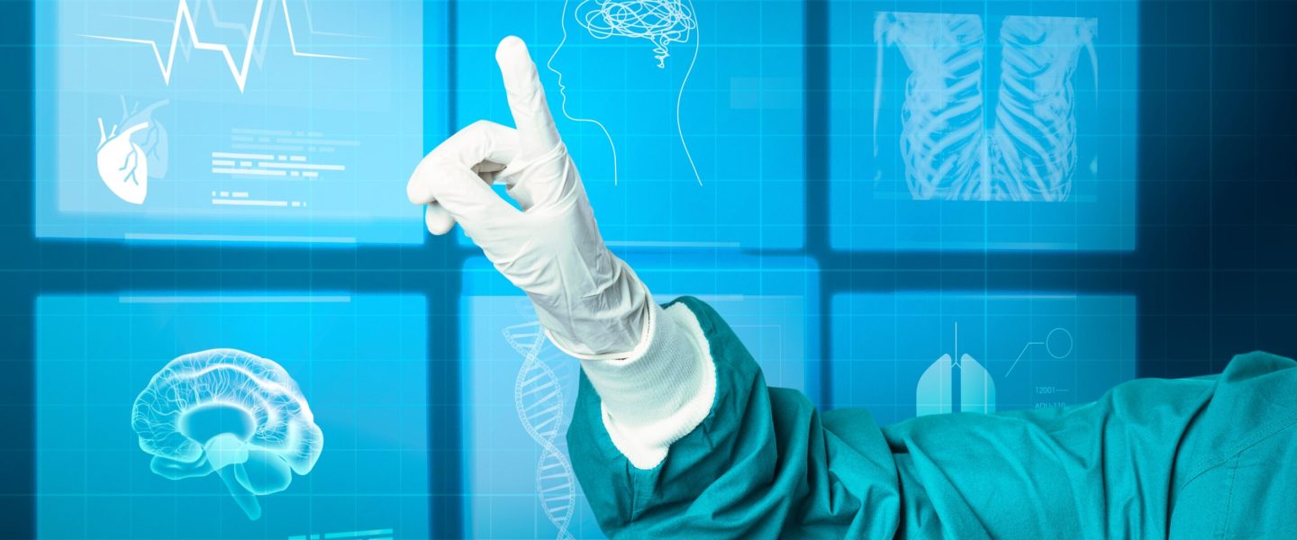 Hand in medical glove pointing to virtual screen medical technology